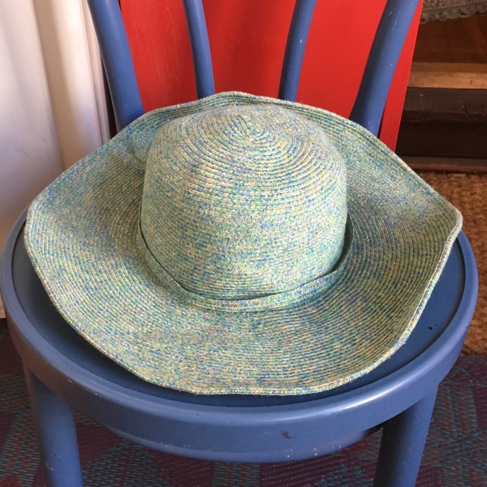 Light blue and tan woven floppy sunhat. One size.